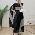 Miyake Fold 2025 Autumn Women's Color Matching New Set Shawl Irregular Top Long Elastic Waist Skirt Two-piece Set